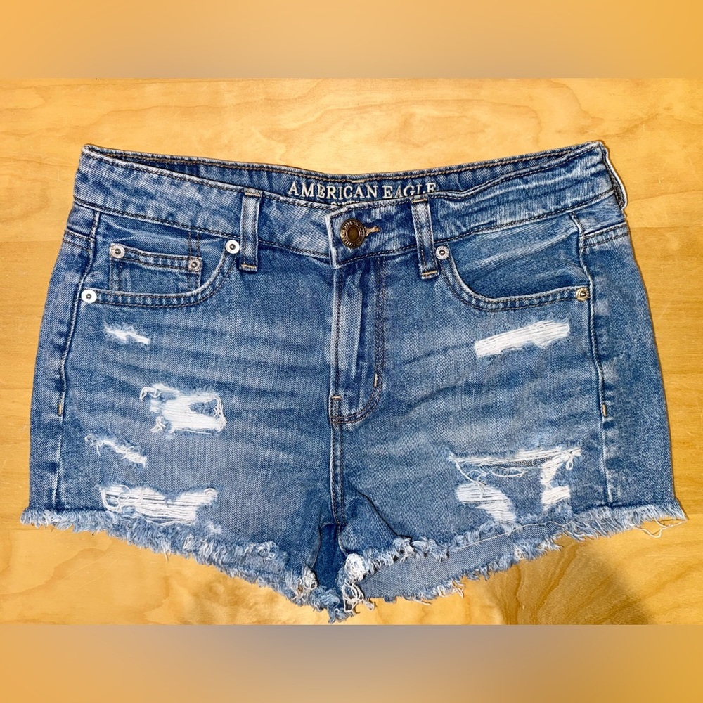 American Eagle Outfitters Denim Light Blue Ripped Tom Girl Shortie
